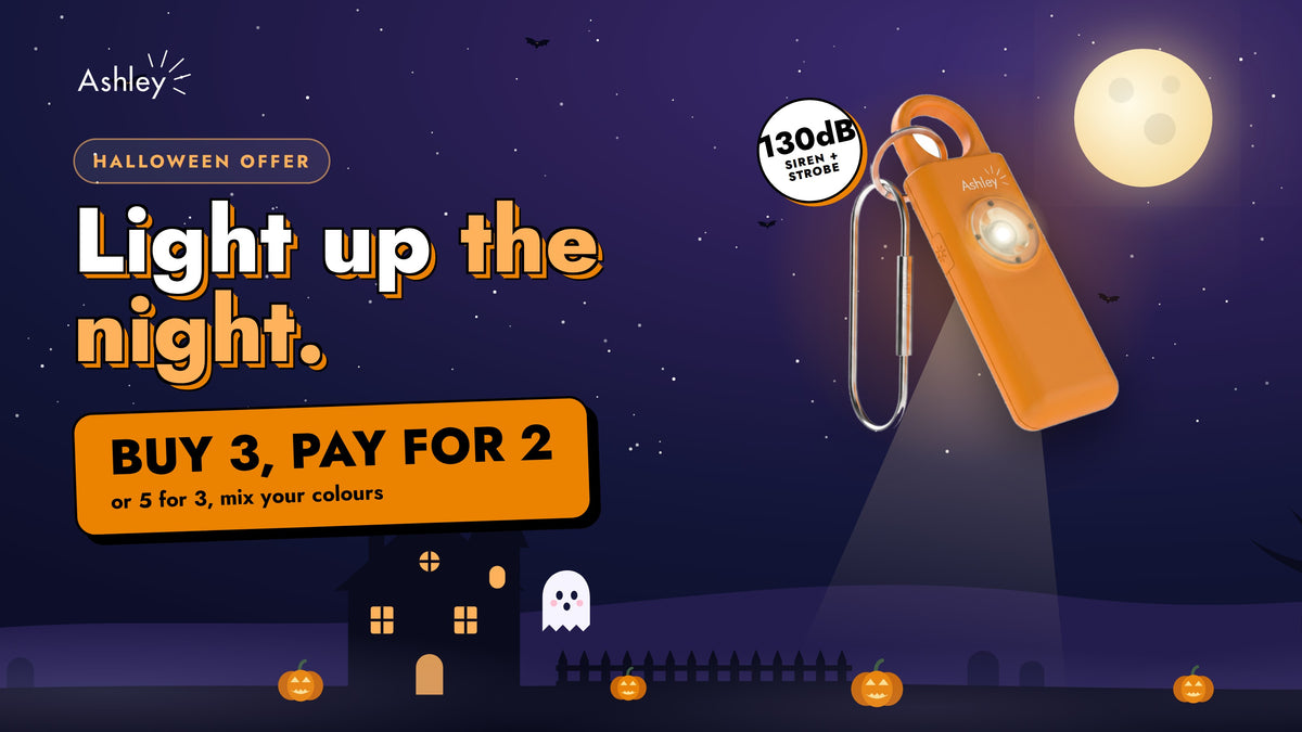 Light up the night: orange Ashley alarm with its torch on under a Halloween moon. Buy 3, pay for 2
